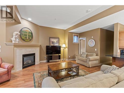 1795 Country Club Drive Unit# 102, Kelowna, BC - Indoor Photo Showing Living Room With Fireplace