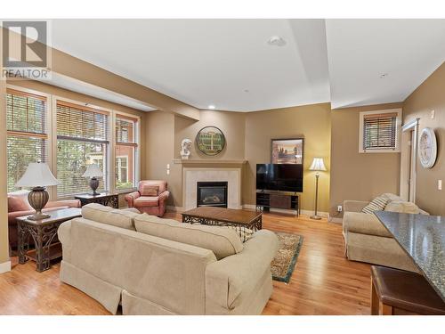 1795 Country Club Drive Unit# 102, Kelowna, BC - Indoor Photo Showing Living Room With Fireplace