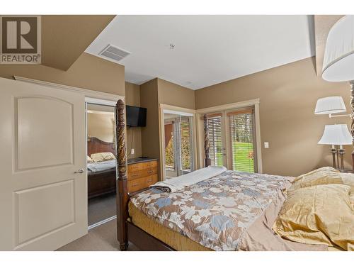 1795 Country Club Drive Unit# 102, Kelowna, BC - Indoor Photo Showing Bedroom