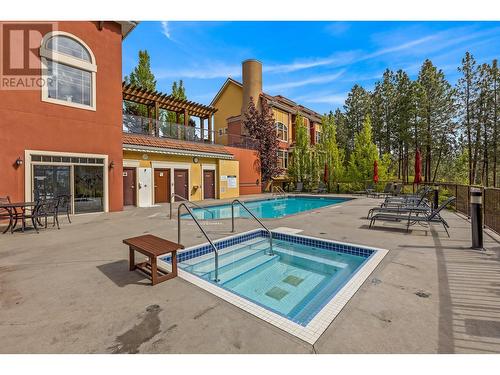 1795 Country Club Drive Unit# 102, Kelowna, BC - Outdoor With In Ground Pool