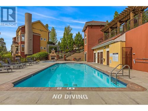 1795 Country Club Drive Unit# 102, Kelowna, BC - Outdoor With In Ground Pool