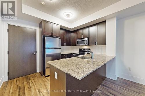 903 - 560 Front Street W, Toronto, ON - Indoor Photo Showing Kitchen With Double Sink