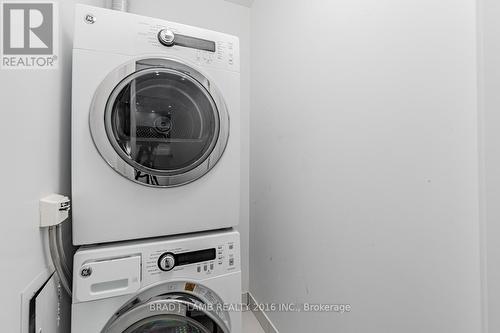 2110 - 55 Regent Park Boulevard, Toronto, ON - Indoor Photo Showing Laundry Room