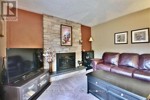 23 Debra Crescent, Barrie, ON - Indoor Photo Showing Living Room With Fireplace