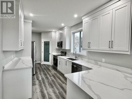 5830 Okanagan Street Unit# 102, Oliver, BC - Indoor Photo Showing Kitchen With Double Sink