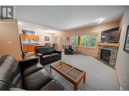 895 Dogwood Drive Unit# 13, Kimberley, BC - Indoor Photo Showing Living Room With Fireplace