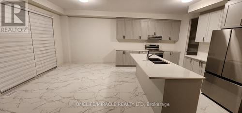 22 Sandhill Crescent, Adjala-Tosorontio, ON - Indoor Photo Showing Kitchen With Double Sink