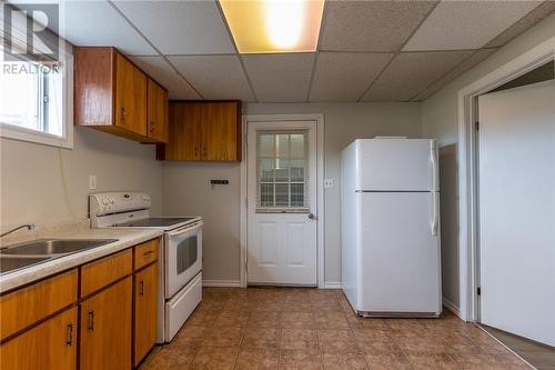 105 Dublin Street, Massey, ON - Indoor Photo Showing Kitchen With Double Sink