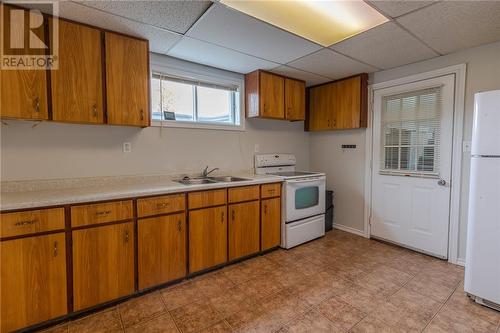 105 Dublin Street, Massey, ON - Indoor Photo Showing Kitchen With Double Sink