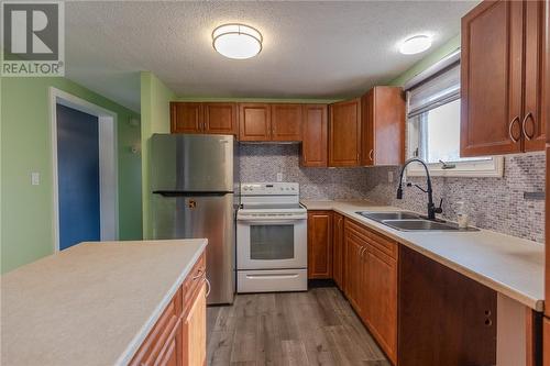 105 Dublin Street, Massey, ON - Indoor Photo Showing Kitchen With Double Sink