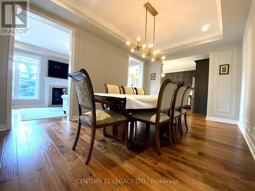 115 Kaitting Trail, Oakville, ON - Indoor Photo Showing Dining Room With Fireplace