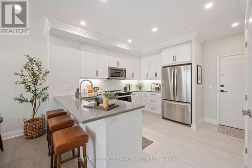 404 - 1560 Upper West Avenue, London, ON - Indoor Photo Showing Kitchen With Stainless Steel Kitchen With Upgraded Kitchen