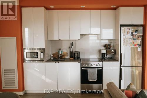 1303 - 49 East Liberty Street, Toronto, ON - Indoor Photo Showing Kitchen With Stainless Steel Kitchen With Upgraded Kitchen