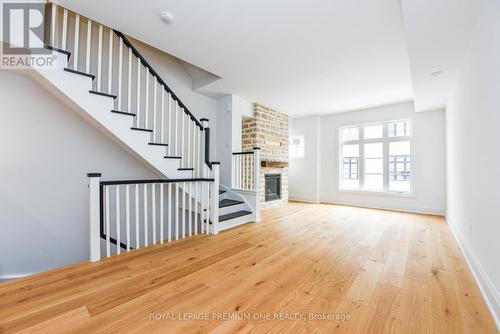 125 - 35 Lunar Crescent, Mississauga, ON - Indoor Photo Showing Other Room With Fireplace