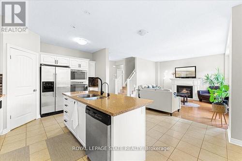 9 Tolton Drive, Guelph, ON - Indoor Photo Showing Kitchen With Fireplace With Double Sink