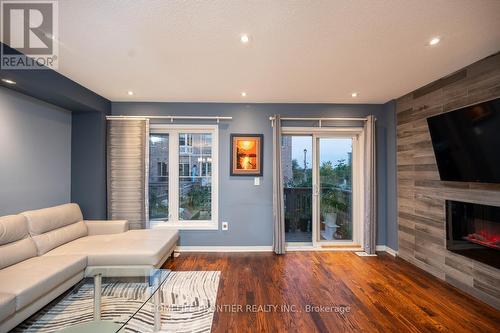 9 Lotus Street N, Brampton, ON - Indoor Photo Showing Living Room With Fireplace