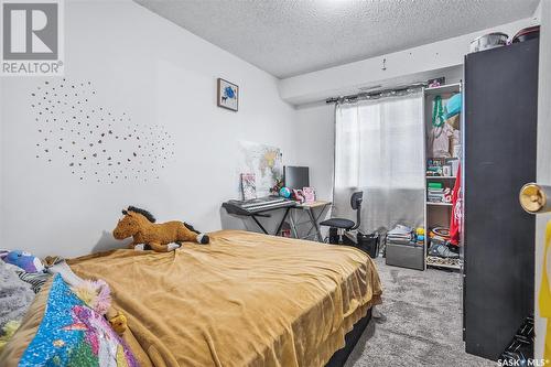 202B 213 Main Street, Martensville, SK - Indoor Photo Showing Bedroom