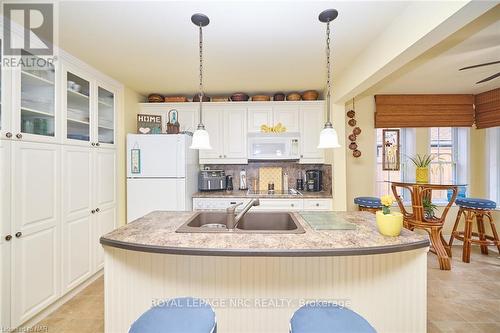 13 Graham Avenue, St. Catharines (438 - Port Dalhousie), ON - Indoor Photo Showing Kitchen With Double Sink