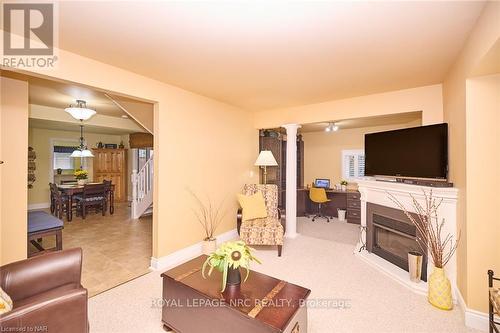 13 Graham Avenue, St. Catharines (438 - Port Dalhousie), ON - Indoor Photo Showing Living Room With Fireplace