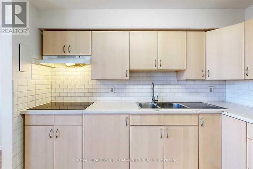 710 - 100 Dundalk Drive, Toronto, ON - Indoor Photo Showing Kitchen With Double Sink