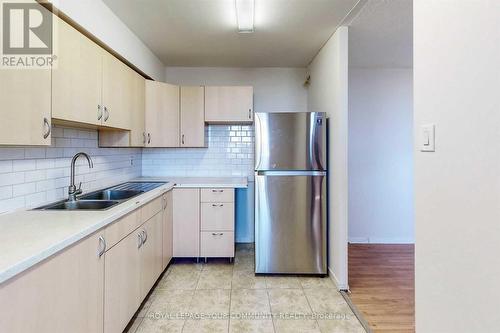 710 - 100 Dundalk Drive, Toronto, ON - Indoor Photo Showing Kitchen With Double Sink