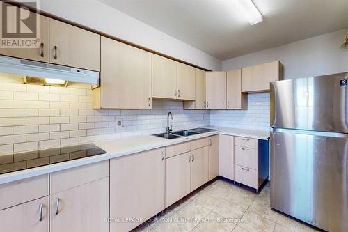 710 - 100 Dundalk Drive, Toronto, ON - Indoor Photo Showing Kitchen With Double Sink