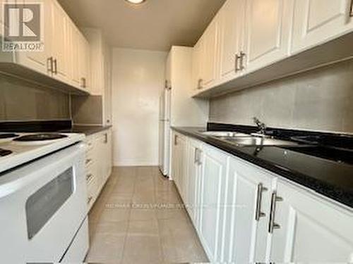 208 - 363 Lakeshore Road E, Mississauga, ON - Indoor Photo Showing Kitchen With Double Sink