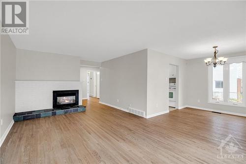 5 Woodmount Crescent, Ottawa, ON - Indoor Photo Showing Living Room With Fireplace