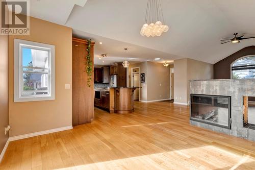 565 San Cabrio Court, Kelowna, BC - Indoor Photo Showing Other Room With Fireplace