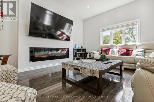 1427 Kains Woods Terrace, London, ON - Indoor Photo Showing Living Room With Fireplace