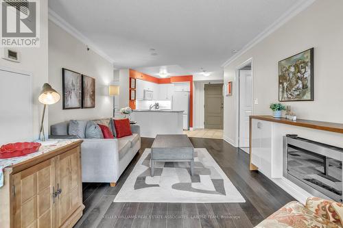 804 - 3 Marine Parade Drive, Toronto, ON - Indoor Photo Showing Living Room With Fireplace