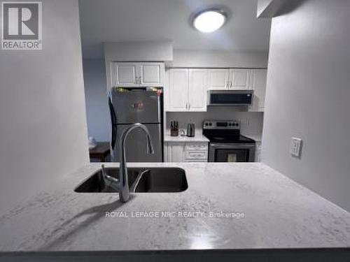 933 - 60 Heintzman Street, Toronto (Junction Area), ON - Indoor Photo Showing Kitchen With Double Sink