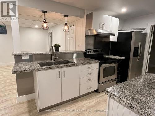 Lower - 23 Free Drive, Orillia, ON - Indoor Photo Showing Kitchen With Double Sink