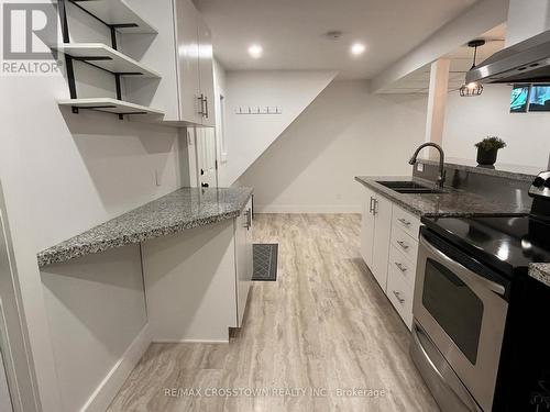 Lower - 23 Free Drive, Orillia, ON - Indoor Photo Showing Kitchen With Double Sink