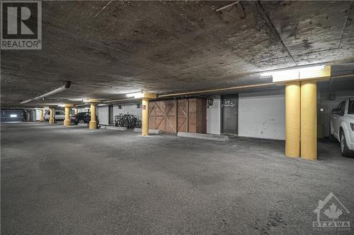 Underground parking access - 1821 Walkley Road Unit#8, Ottawa, ON - Indoor Photo Showing Garage