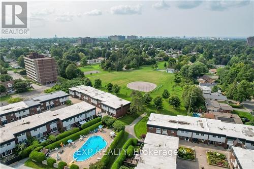 8 - 1821 Walkley Road, Ottawa, ON - Outdoor With In Ground Pool With View