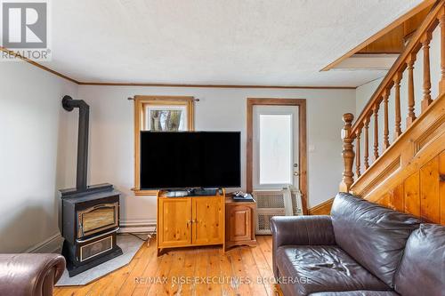 3761 Battersea Road, South Frontenac (Frontenac South), ON - Indoor Photo Showing Living Room With Fireplace