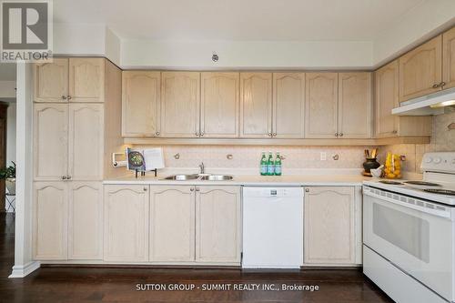 708 - 4640 Kimbermount Avenue, Mississauga, ON - Indoor Photo Showing Kitchen With Double Sink