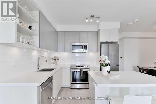 1110 - 4677 Glen Erin Drive, Mississauga, ON - Indoor Photo Showing Kitchen With Upgraded Kitchen