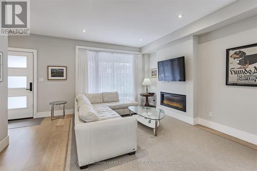 228 Donlands Avenue, Toronto, ON - Indoor Photo Showing Living Room With Fireplace