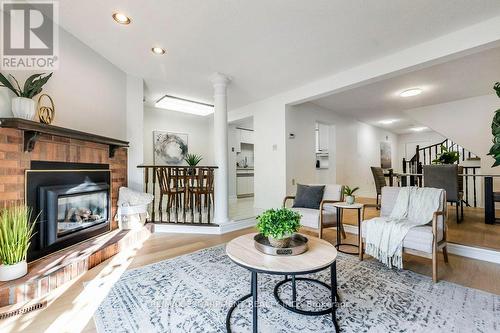 56 - 3050 Orleans Road, Mississauga, ON - Indoor Photo Showing Living Room With Fireplace