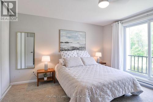 Unit 16 - 2 Paradise Boulevard, Ramara, ON - Indoor Photo Showing Bedroom