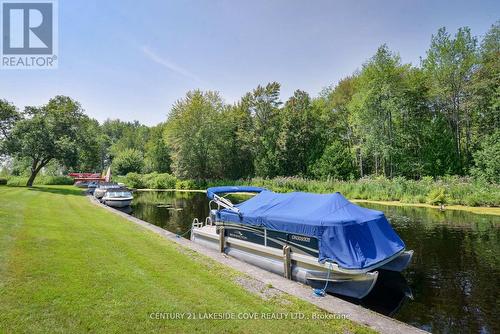 Unit 16 - 2 Paradise Boulevard, Ramara, ON - Outdoor With Body Of Water With Deck Patio Veranda