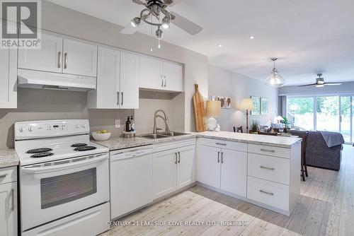 Unit 16 - 2 Paradise Boulevard, Ramara, ON - Indoor Photo Showing Kitchen With Double Sink