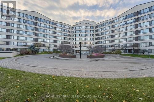 714 - 1001 Cedarglen Gate, Mississauga, ON - Outdoor With Facade