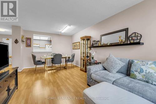 714 - 1001 Cedarglen Gate, Mississauga, ON - Indoor Photo Showing Living Room