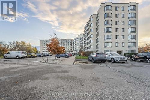 714 - 1001 Cedarglen Gate, Mississauga, ON - Outdoor With Facade