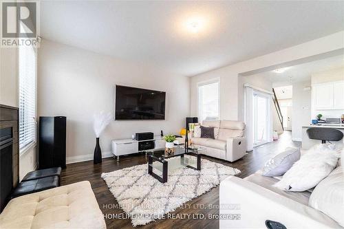 1301 Sandbar Street, London, ON - Indoor Photo Showing Living Room With Fireplace