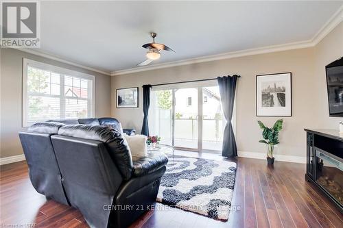 86 - 1850 Beaverbrook Avenue, London, ON - Indoor Photo Showing Living Room With Fireplace