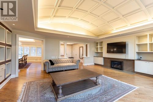 79 Forest Grove Drive, Toronto, ON - Indoor Photo Showing Living Room With Fireplace